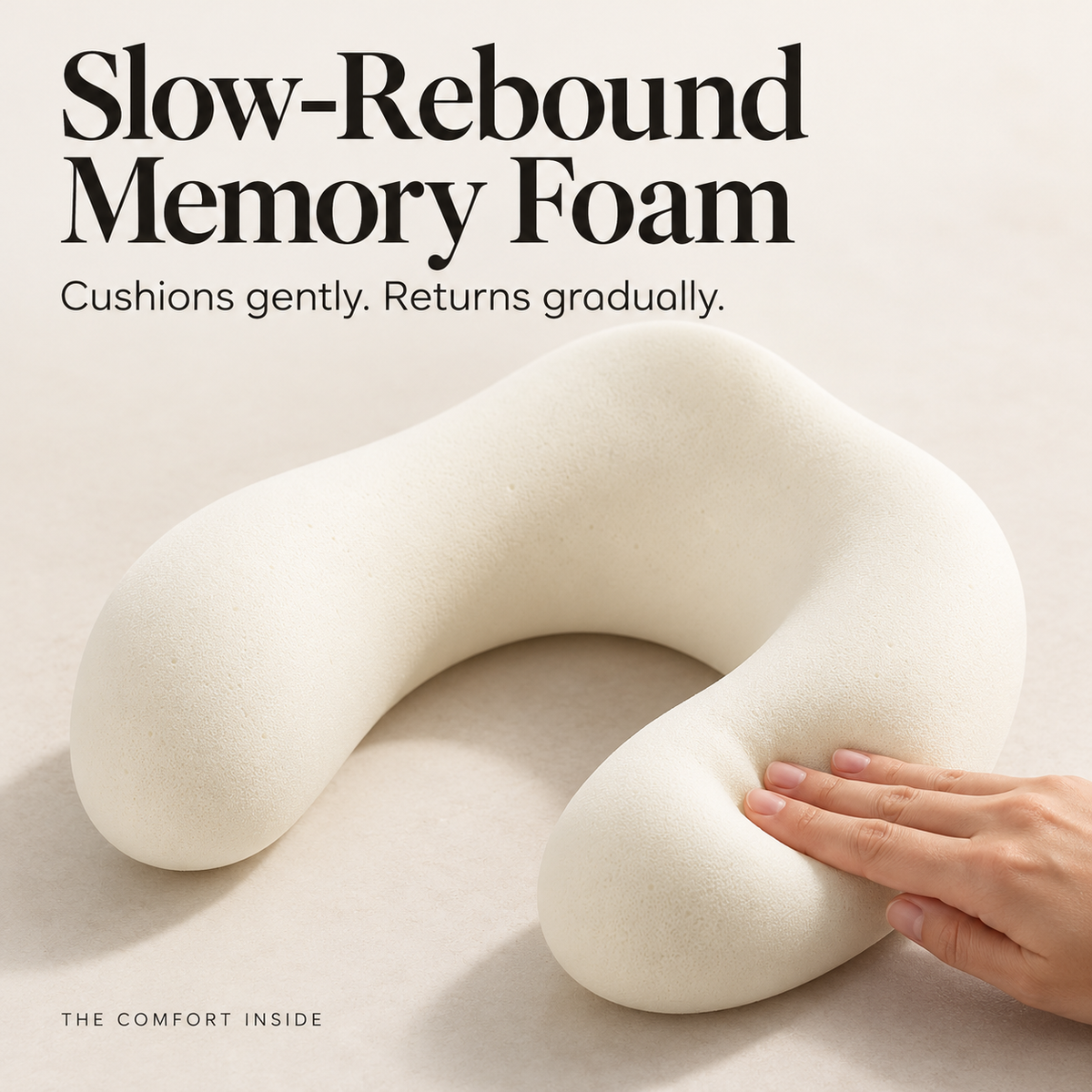 Close-up of a hand gently compressing the contoured slow-rebound memory foam core
