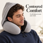 Side profile showing the light gray neck pillow resting around an adult traveler's neck