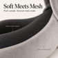 Macro detail of light gray plush fabric meeting the dark inner mesh panel